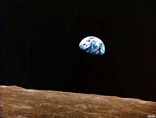 WholeDude-WholeDesigner: A view of Planet Earth from Lunar surface. Photo image by Apollo8 astronaut taken on December 25, 1968. When viewed from the surface of Moon, the Sky appears dark, and Black.