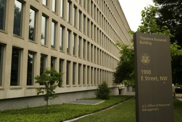 The U.S. Office of Personnel Management building in Washington June 5, 2015. In the latest in a string of intrusions into U.S. agencies' high tech systems, the Office of Personnel Management (OPM) suffered what appeared to be one of the largest breaches of information ever on government workers. The office handles employee records and security clearances.  REUTERS/Gary Cameron