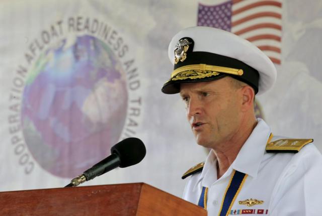 U.S. Navy Rear Admiral William Merz delivers a statements during the opening ceremony of Cooperation Afloat Readiness and Training (CARAT) 2015 at navy headquarters in Puerto Princesa city, Palawan, west Philippines June 22, 2015. The Philippines will hold separate naval exercises with U.S. and Japanese forces this week on a Philippine island that is not far from the disputed Spratly archipelago, where China's rapid creation of seven island outposts is stoking regional tensions.  REUTERS/Romeo Ranoco