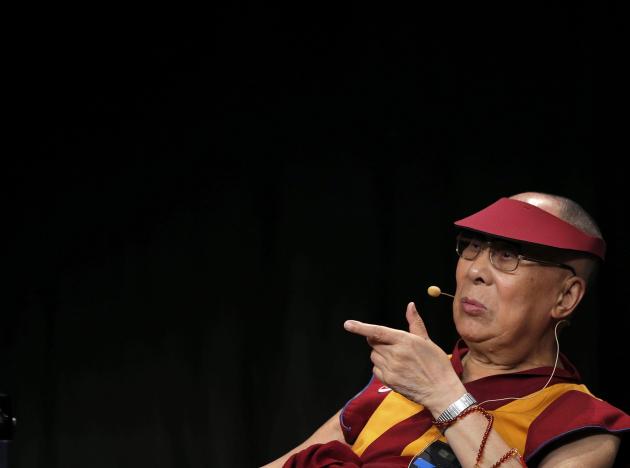 Tibet's exiled spiritual leader the Dalai Lama gestures as he attends a meeting with youth in Strasbourg, France, September 15, 2016. REUTERS/Vincent Kessler